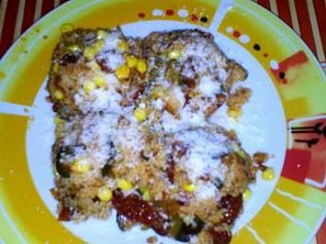 Kuskus s cuketou, sušenými rajčaty, kukuřicí a parmezánem